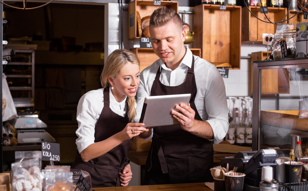 Small business owners enjoying the support of customers